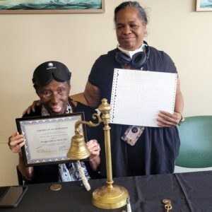 Margaret – Posing with Sabrina (Senior ITR Instructor) holding her certificate of completion.