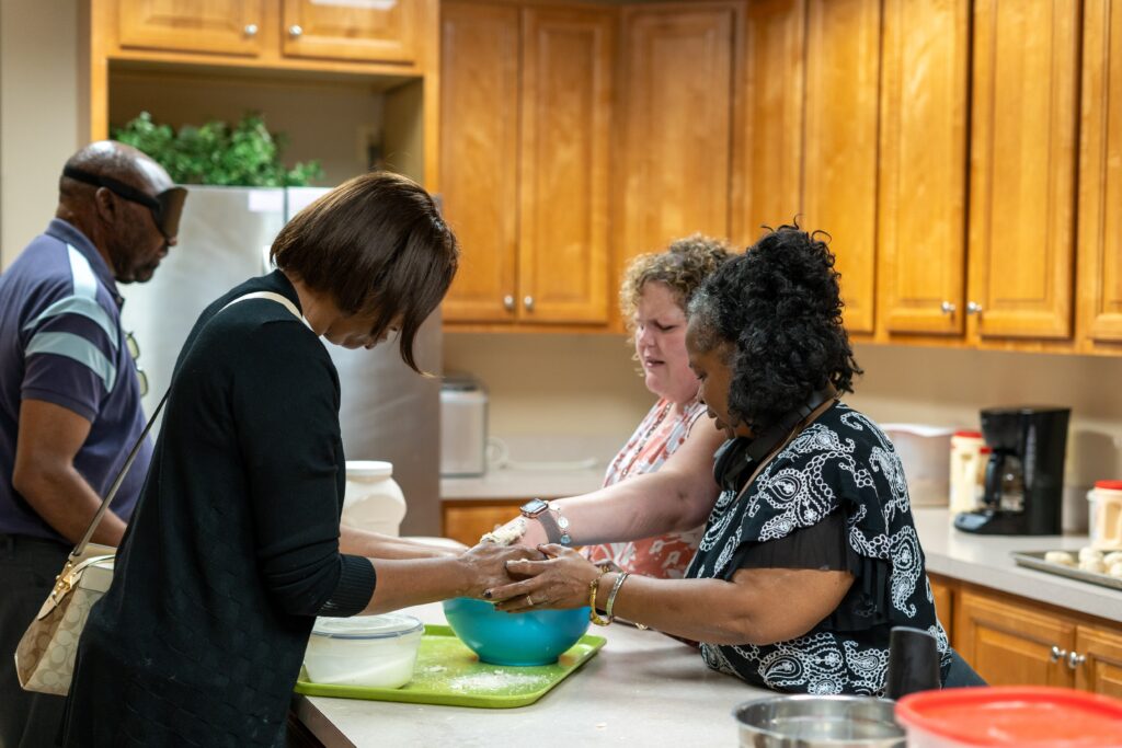 Senior students in the kitchen baking something good.
