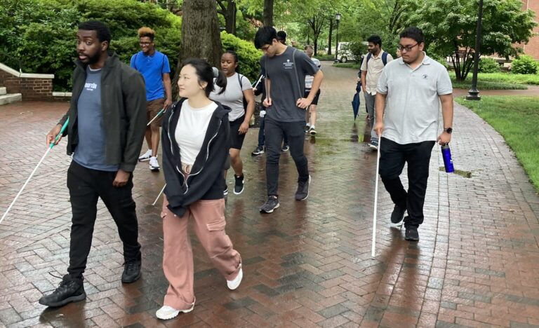Group of students walking downtown Baltimore