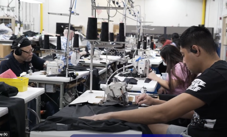 Multiple BISM Associates working at sewing machines