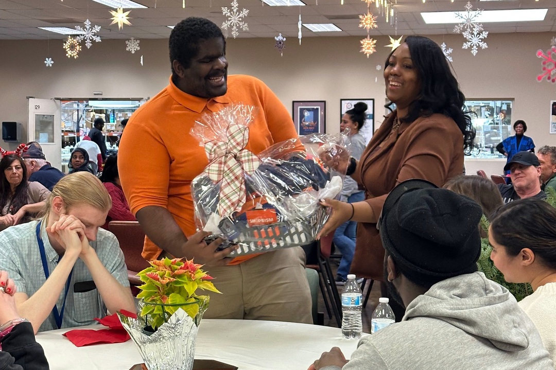 Qualik Ford receiving holiday basket that he won!
